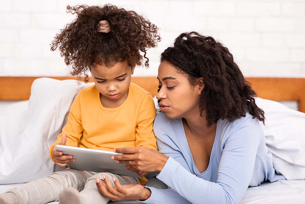 Parent using best parenting style about technology