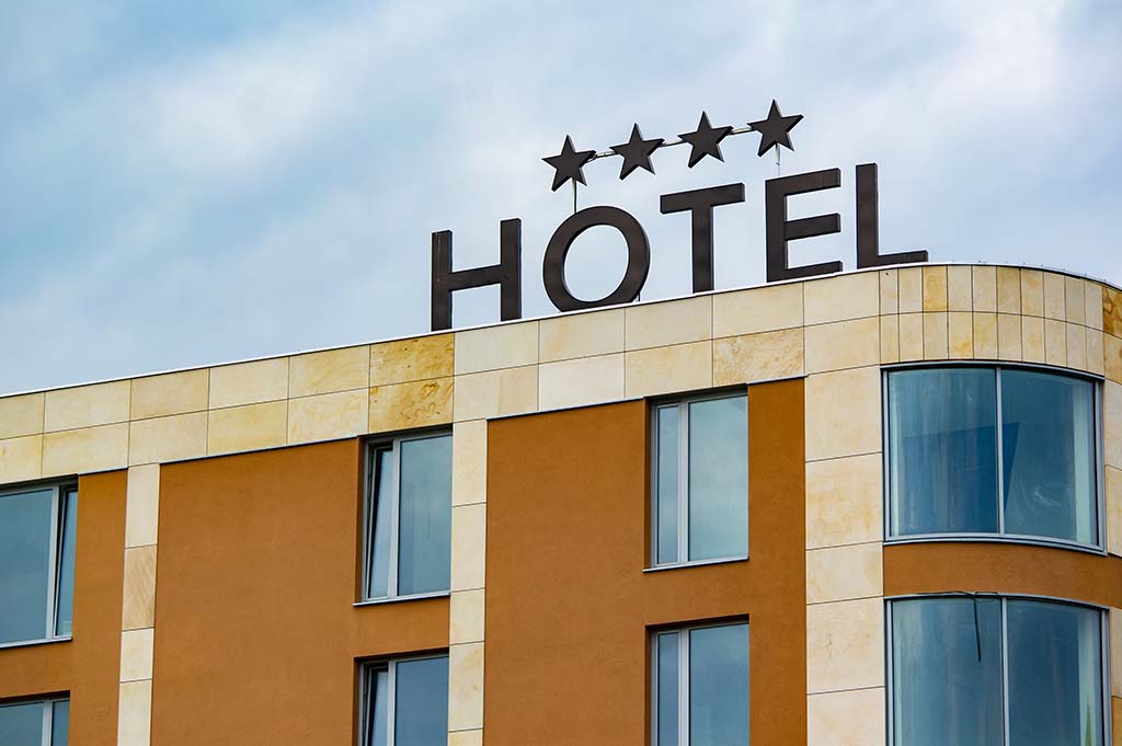 Generic building with sign hotel and 4 star on the roof