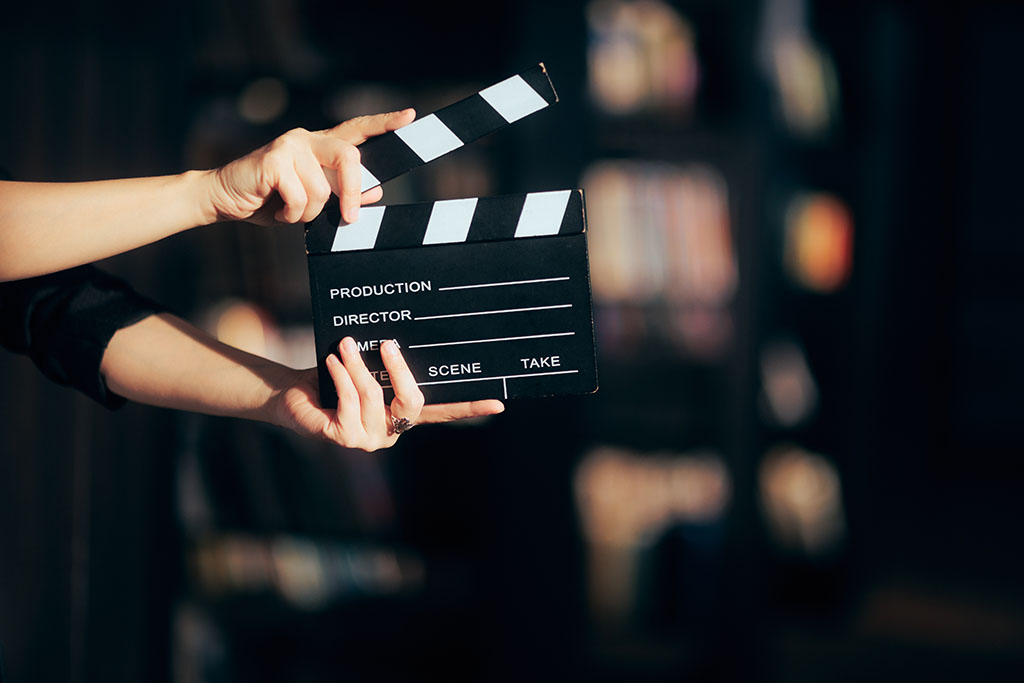 Hands holding a film slate